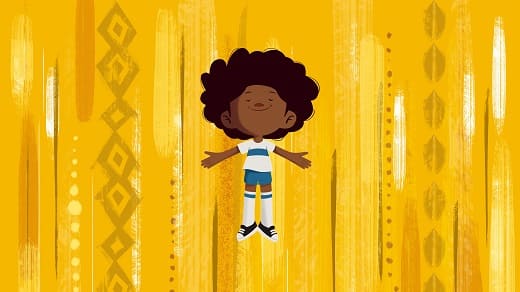 Fotograma de animación: una niña negra vestida con uniforme escolar parece volar sonriente sobre un fondo amarillo.